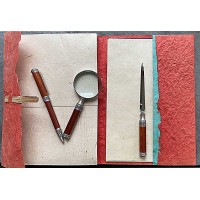 Set ballpoint pen, letter opener and magnifying glass